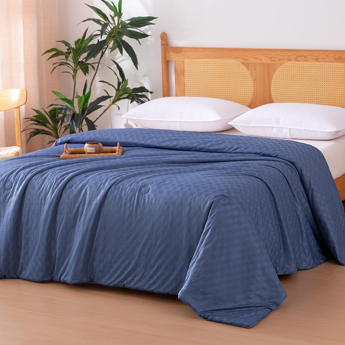 Amazon Basics cooling comforter close-up highlights breathable weave detail for hot sleepers.