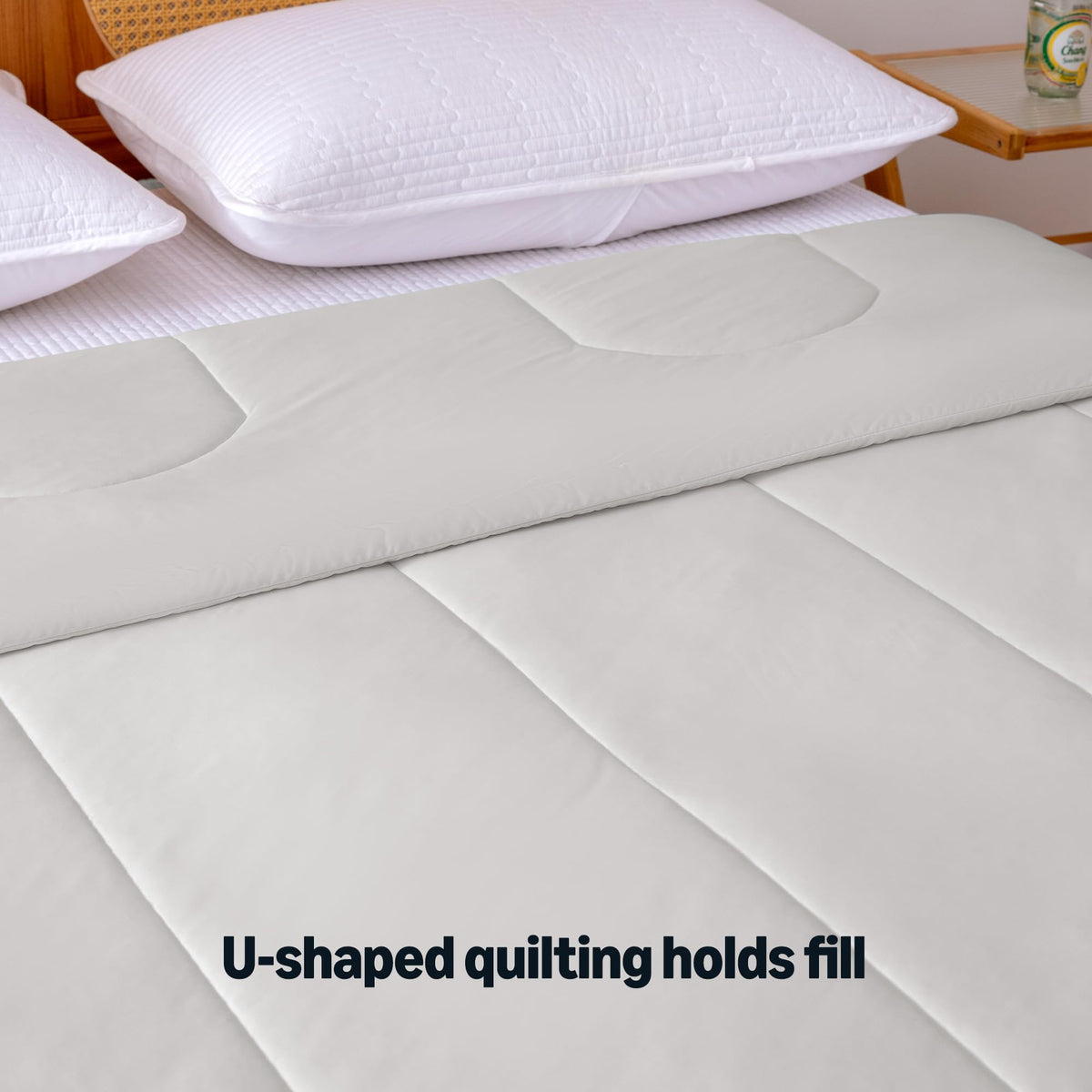 Amazon Basics cooling comforter with even quilting securing filling for lasting shape