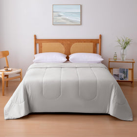 Amazon Basics Cooling Comforter front view; lightweight cooling for warm nights and year-round use.