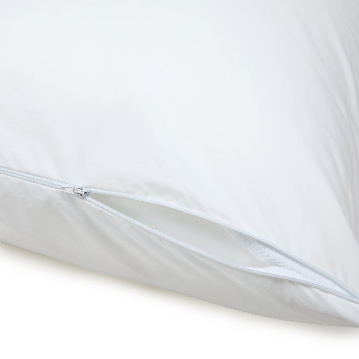 Amazon Basics cotton protector close-up showing tight weave and breathability.