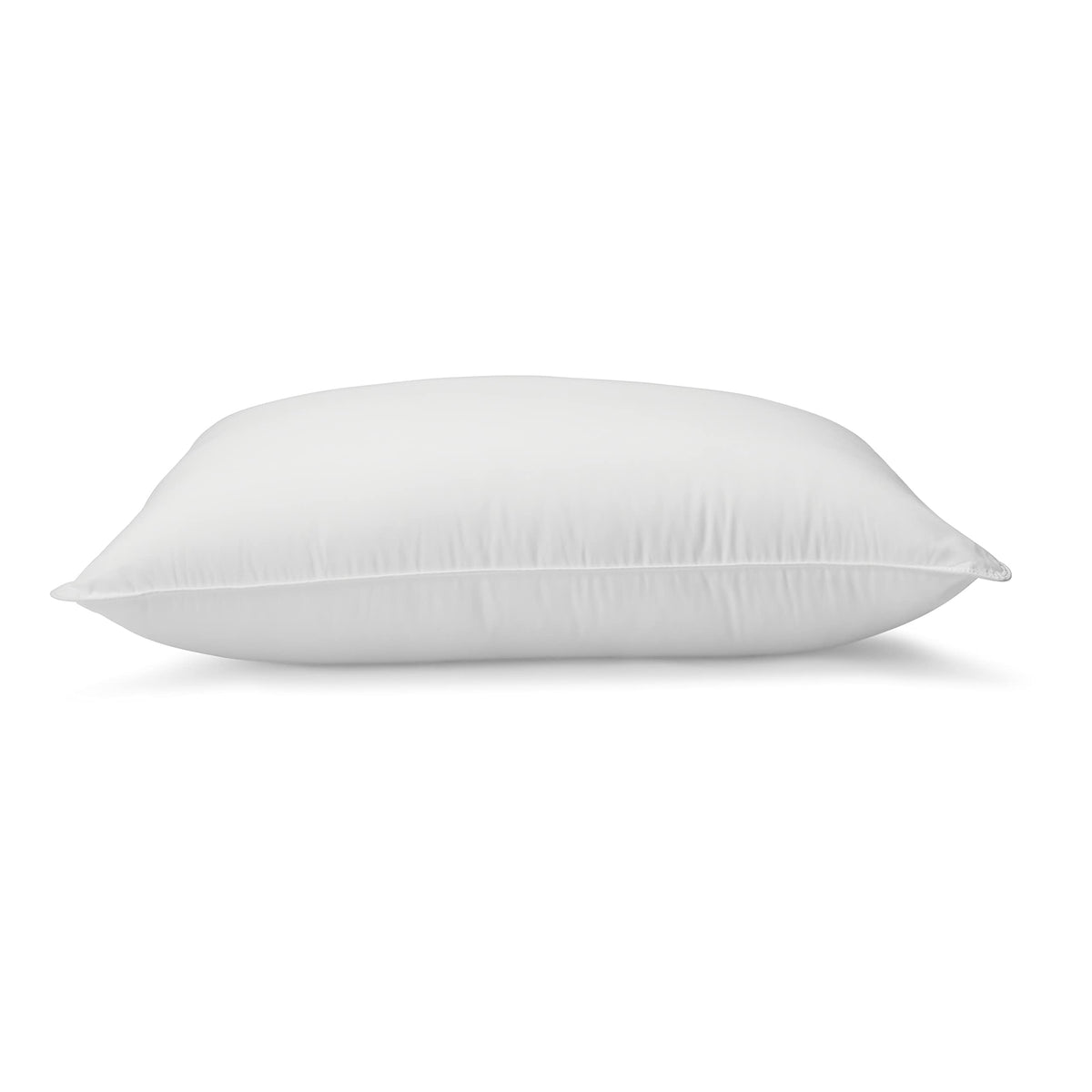 Amazon Basics pillow on bed for allergy-conscious users