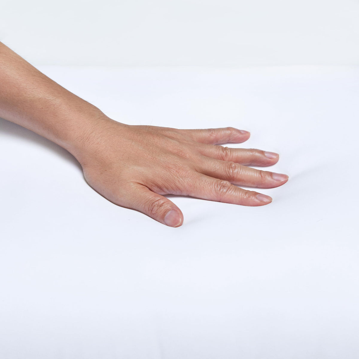 Amazon Basics pillow close-up microfiber shell showing softness and strength