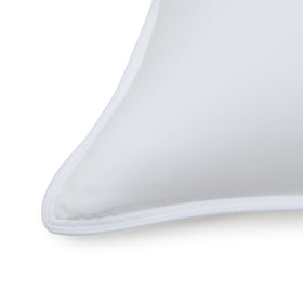 Amazon Basics pillow edge piping; reinforced edge helps maintain shape over time.