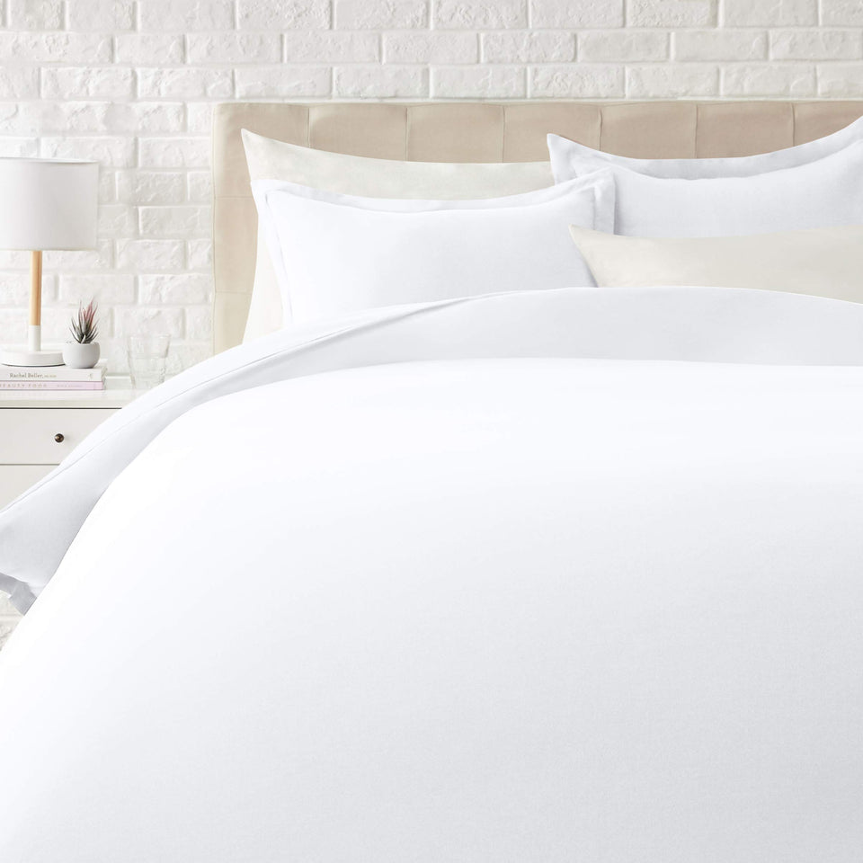 Amazon Basics duvet cover King in bright white offers a soft, lightweight layer for cozy nights.