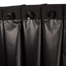 Amazon Basics energy-saving blackout curtain blocks sun to help regulate temperature.