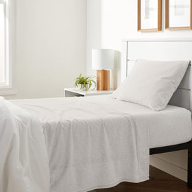 Amazon Basics flat sheet for twin bed in oatmeal adds breathable layering.