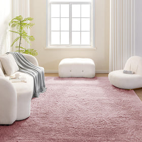 Close-up of pink fibers and plush texture on the Amazon Basics rug.