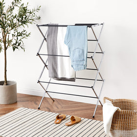 Amazon Basics foldable laundry rack assembled for indoor air drying.