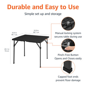 Amazon Basics folding table demonstrates pinch-free opening for fast setup.