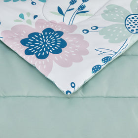 Amazon Basics pillowcase with bluish flowers complements kid-friendly design