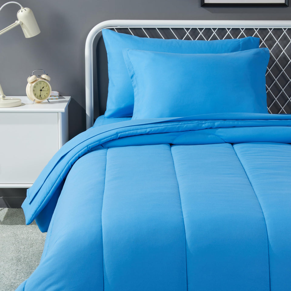Amazon Basics kids bedding comforter in blue highlights plush softness for all-season use.