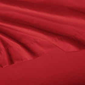 Amazon Basics Kid's Sheet Set Full Red Solid color adds cheerful bedroom style.