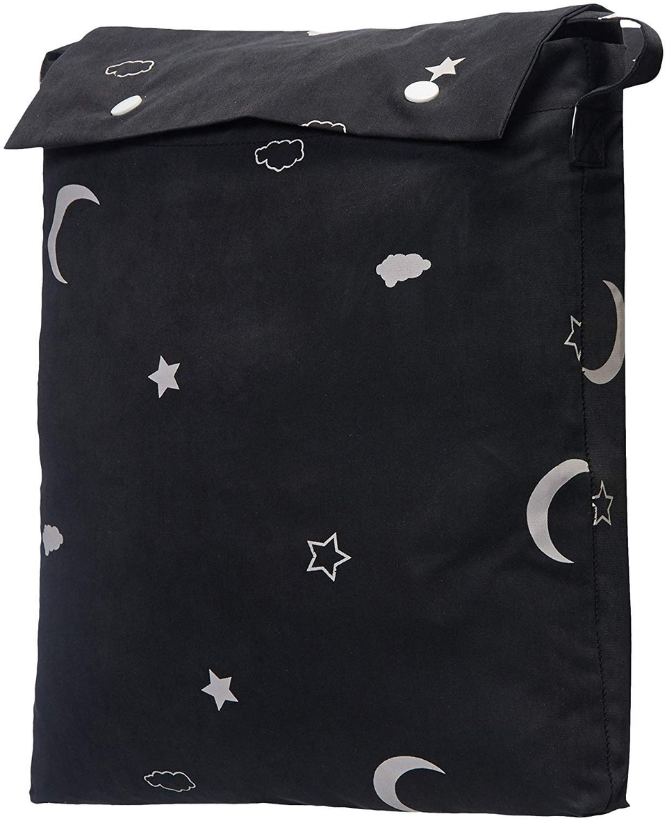 Amazon Basics Moon and Stars curtain mounted with suction cups on window for drill-free setup