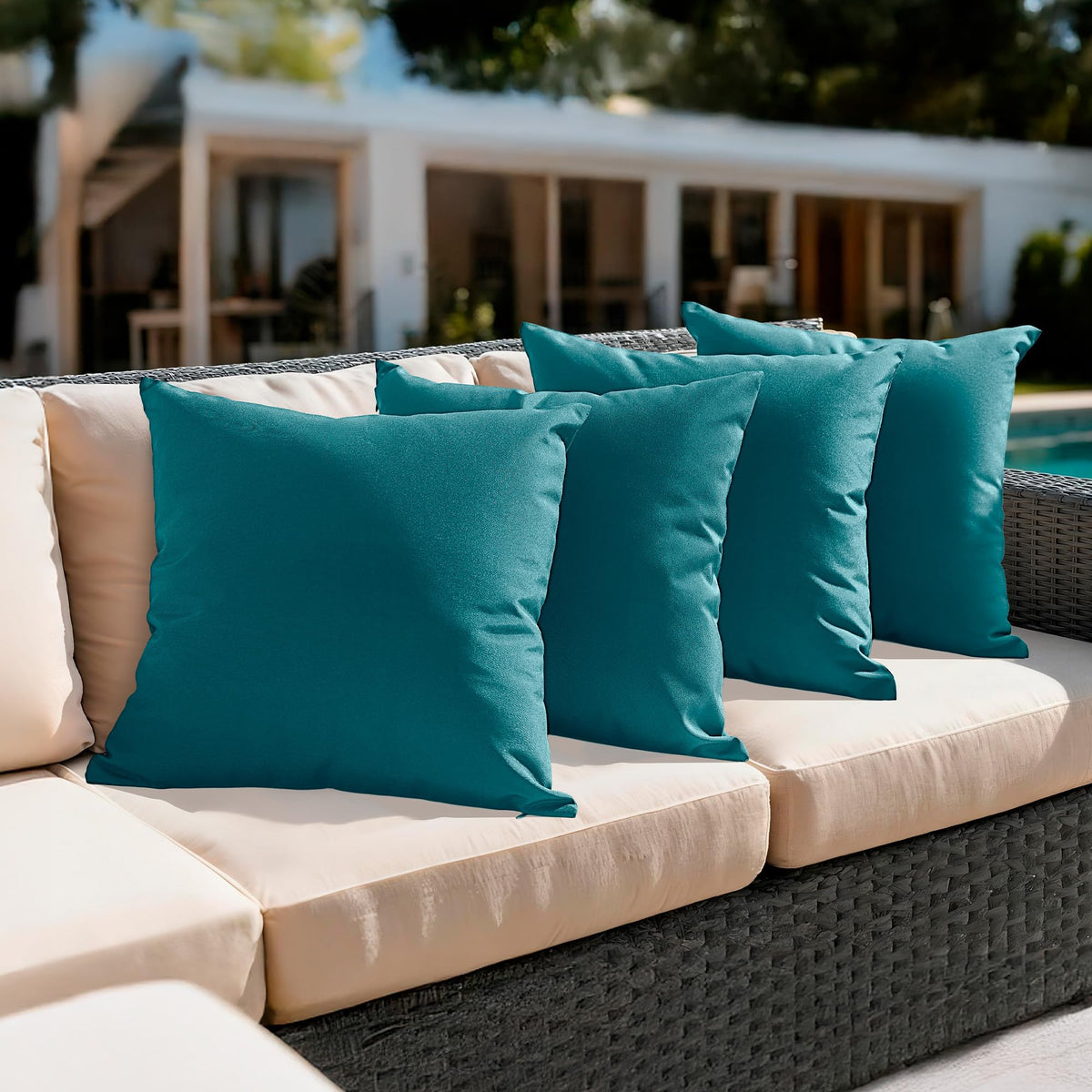 Amazon Basics teal outdoor pillow cover in front view for patio decor