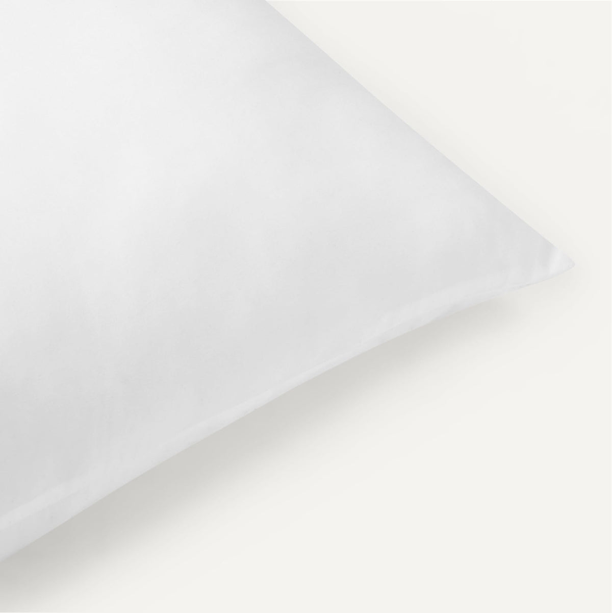 Amazon Basics pillow refluff guide demonstrates easy care and loft restoration.