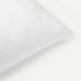 Amazon Basics pillow refluff guide demonstrates easy care and loft restoration.