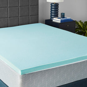 Amazon Basics queen cooling topper unrolled on bed for added comfort and support