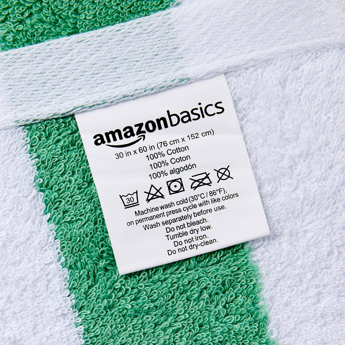 Amazon Basics quick-dry towel shown at poolside use