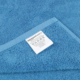 Amazon Basics quick-dry towel in lake blue folded for compact storage