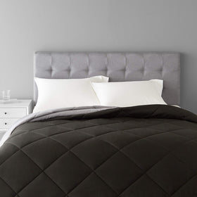 Amazon Basics reversible all-season king comforter in black and grey offering two looks for flexible styling.