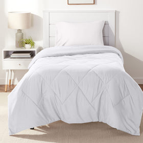 Amazon Basics reversible microfiber comforter Twin XL white showing dual-season warmth