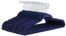 Amazon Basics slim velvet hangers keep shirts neatly in a compact closet.