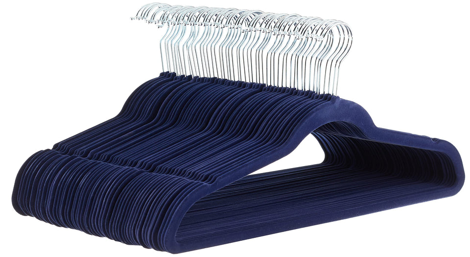 Amazon Basics slim velvet hangers keep shirts neatly in a compact closet.