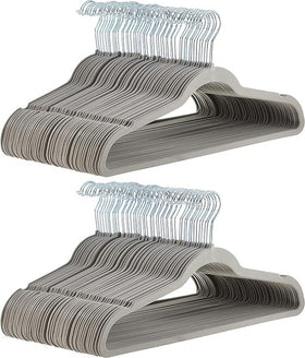 Amazon Basics slim velvet non-slip hanger in gray demonstrates compact space-saving design.