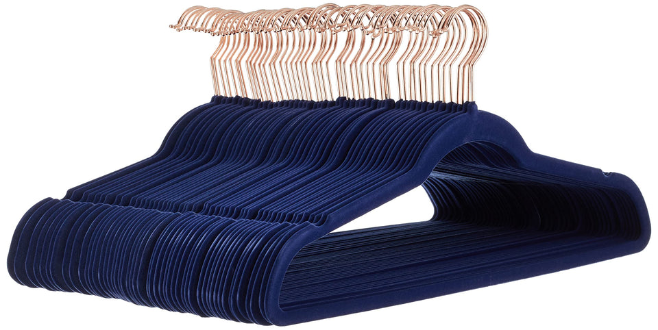 Amazon Basics slim velvet hangers in navy with rose-gold accents for space-saving closet organization