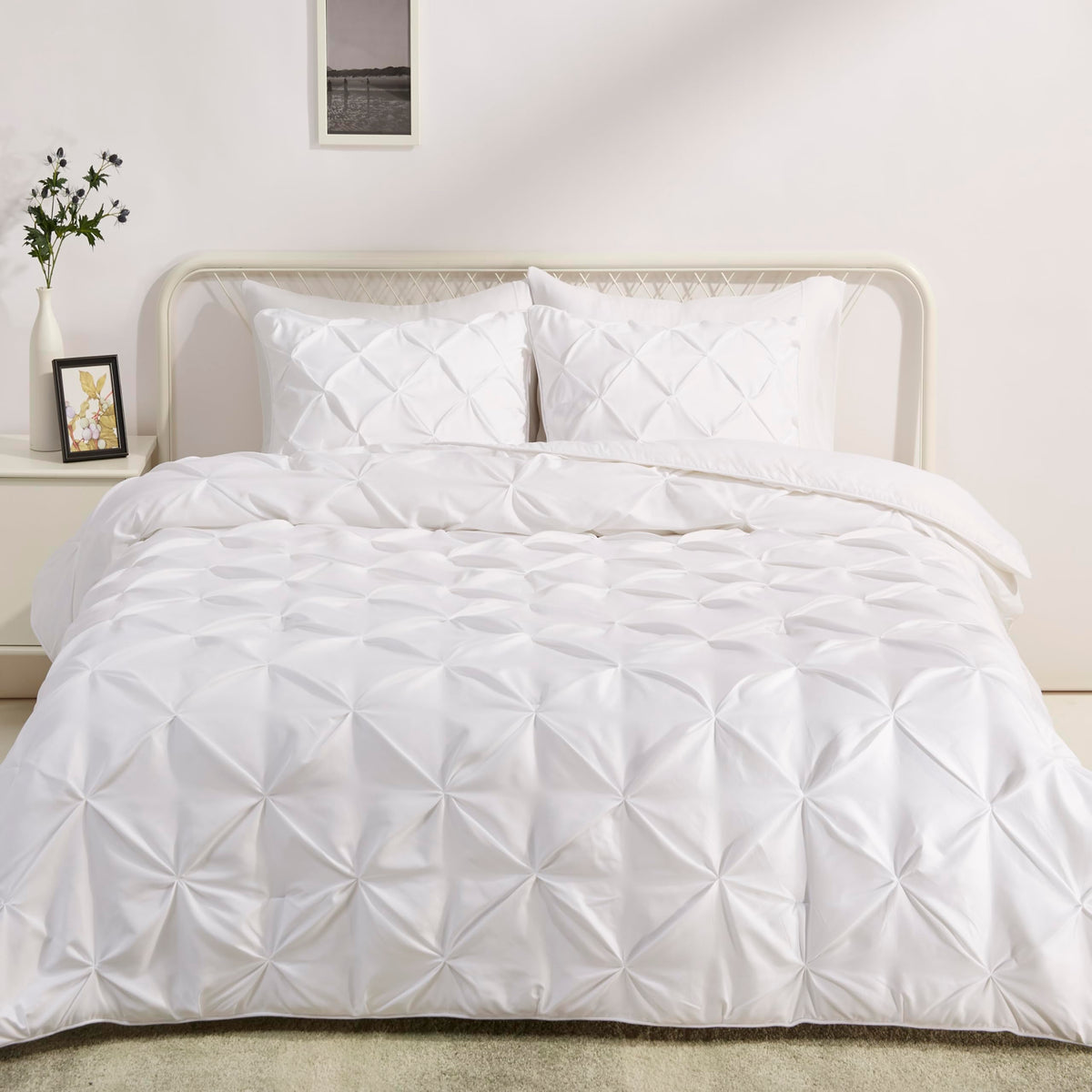 Amazon Basics soft down-alternative comforter in full-queen size offers lightweight warmth and breathability.