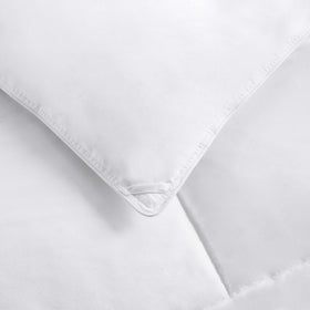 Amazon Basics soft polyester microfiber shell with plush 300 gsm fill.