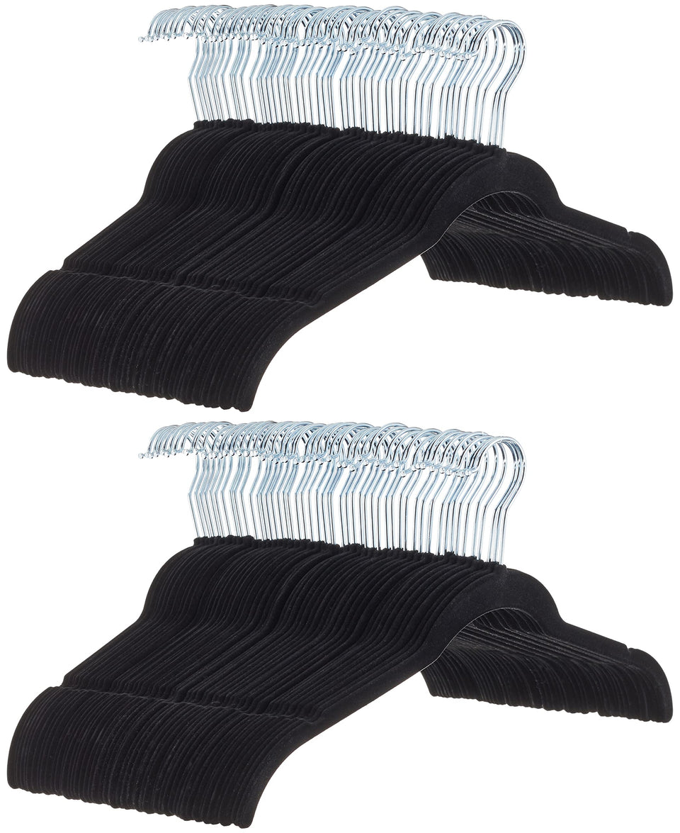 Amazon Basics space-saving velvet hangers in a black pack neatly organizing garments
