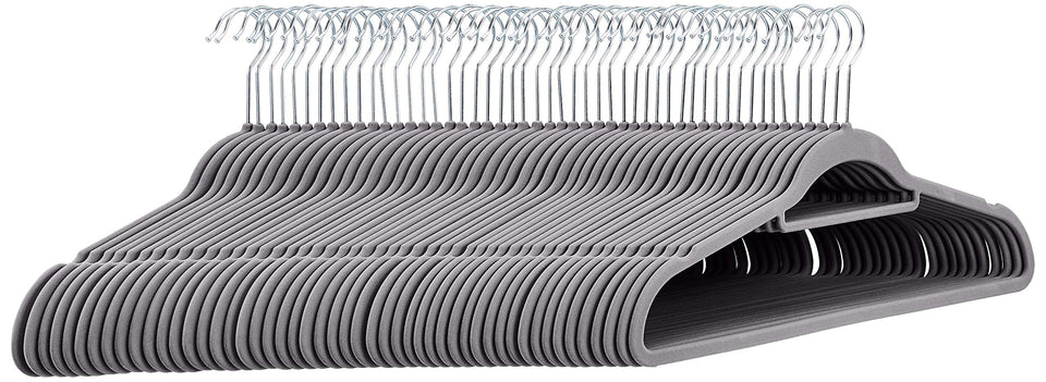 Amazon Basics space-saving velvet hangers with dark grey finish optimize closet space.