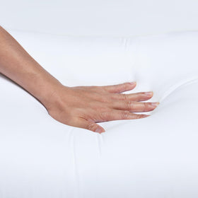 Amazon Basics pillow edge piping detail highlights durable construction for daily use.