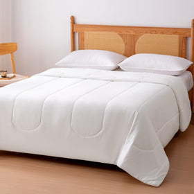 Amazon Basics temperature regulation blanket demonstrates lightweight cooling for warm nights.