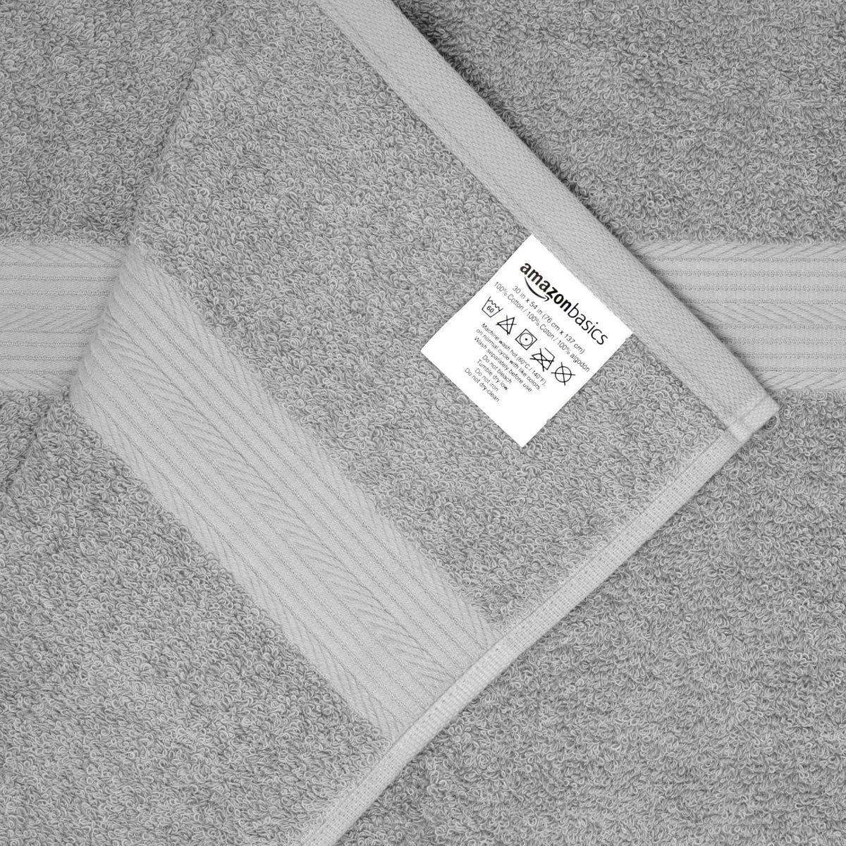 Amazon Basics washcloths in gray, soft texture for gentle cleansing.