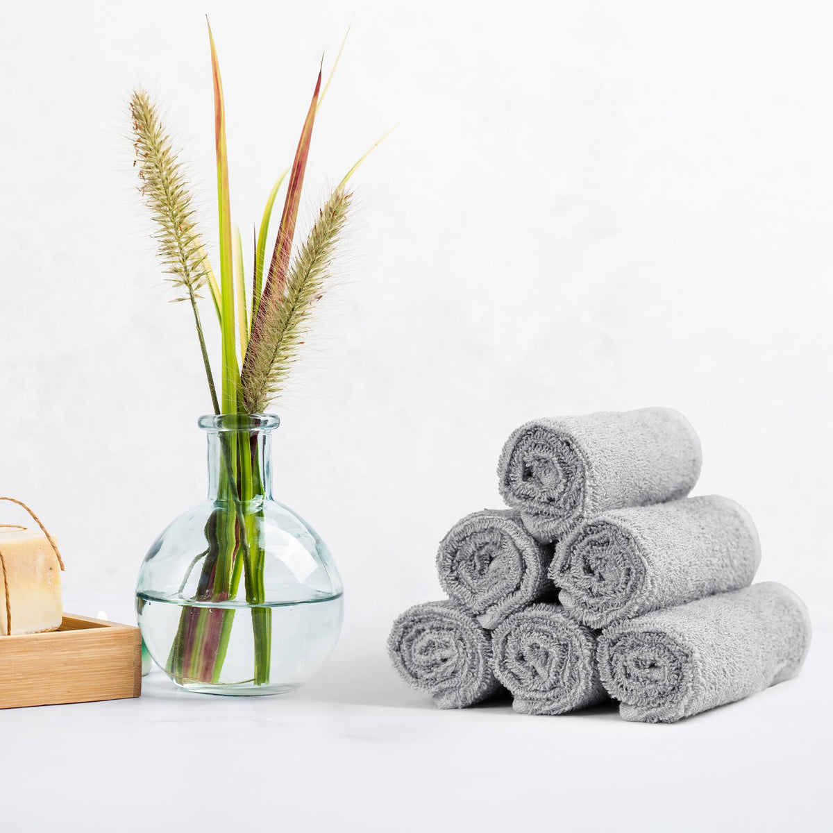 Amazon Basics gray washcloth on a bathroom counter suggests versatile cleaning and personal care.