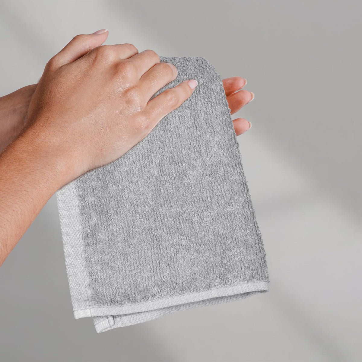 Amazon Basics gray washcloths terry weave closeup highlights softness and durability.