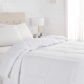 Amazon Basics white down-alternative comforter with corner tabs for secure duvet cover