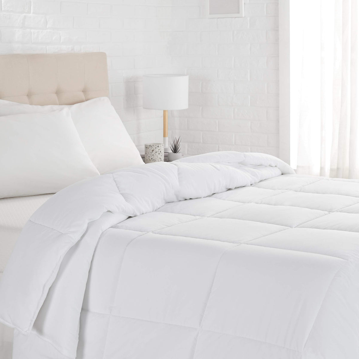 Amazon Basics king white down-alternative comforter with corner tabs for easy duvet setup