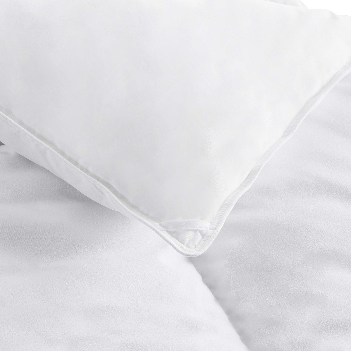 Amazon Basics white down-alternative comforter king shell texture emphasizes softness