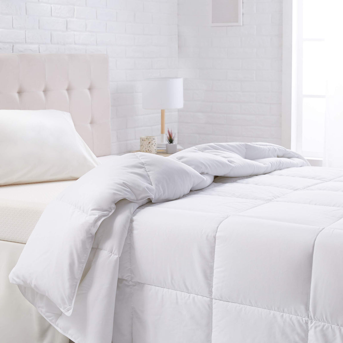 Amazon Basics white down-alternative comforter king size for all-season warmth.