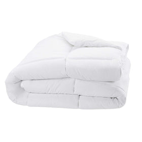 Amazon Basics white down-alternative comforter spread on a bed for soft warmth