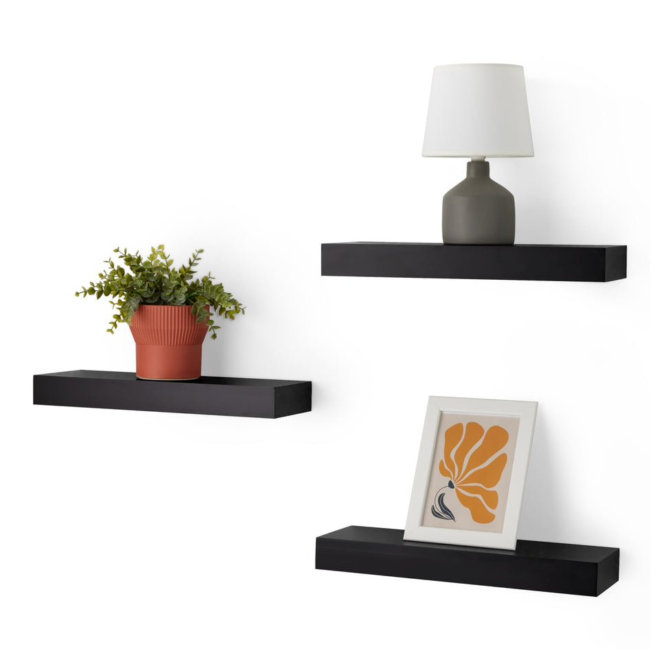 Amazon Basics wood floating shelves 3-pack in black mounted on wall for extra storage