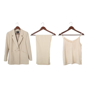 Amazon Basics wood suit hangers offering shoulder support for jackets and coats.