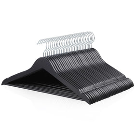 Amazon Basics wood suit hanger close-up with smooth black finish for gentle garment care.