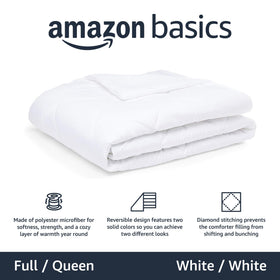 Amazon Basics all-season comforter shown in a clean bed setup for layered bedding look