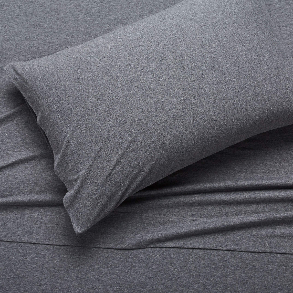 Amazon Basics pillowcase highlighting smooth finish and easy care.