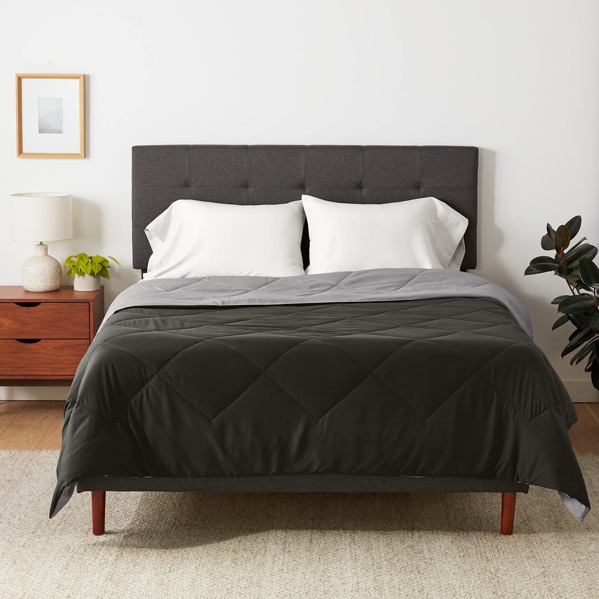 Amazon Basics comforter blanket with reversible Black and Grey sides for all-season use.