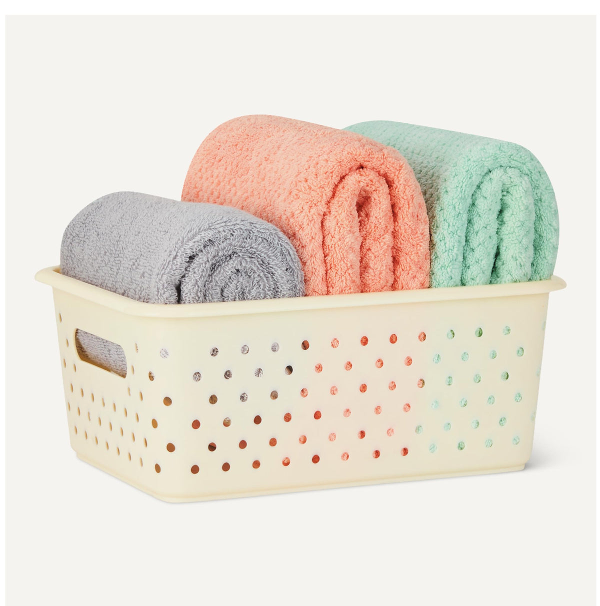 Amazon Basics BPA-free plastic basket close-up highlights durable, decorative design.